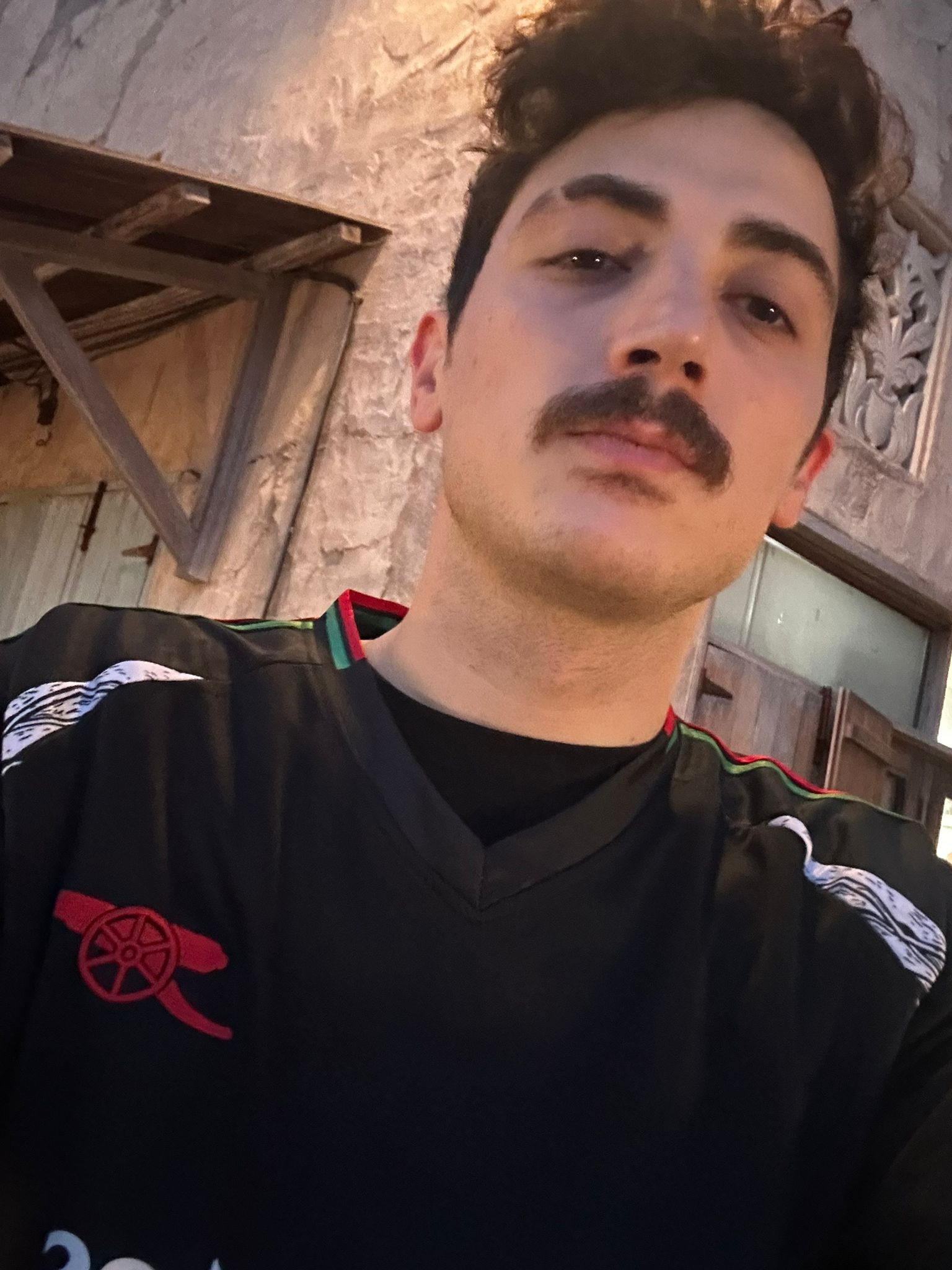 Bowz's original phone selfie before Framio AI portrait generation